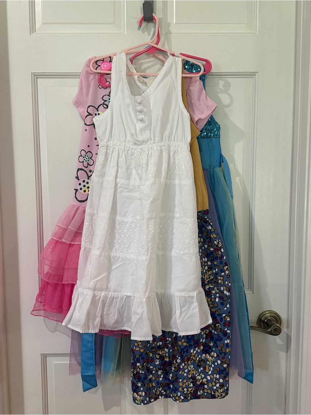 FOUR dresses. White cotton, HelloKitty, blue multicolor, & gold/multi specs